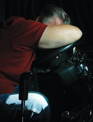 <p><strong>Grabbing a quick nap during a driving shift is a good way to restore alertness. Scheduling should allow drivers time to nap.</strong> <em>Photo Jim Park</em></p>