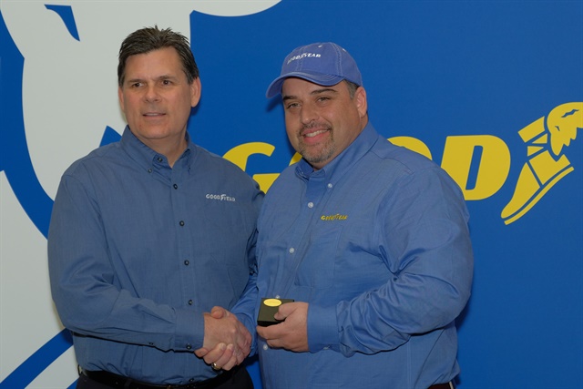 <p><strong>Gary Medalis (left), Goodyear marketing director, congratulates the 2018 Highway Hero Award winner, Frank Vieira of Hamilton, Ontario, Canada. </strong><em>Photo: Jim Park</em><strong><br /></strong></p>