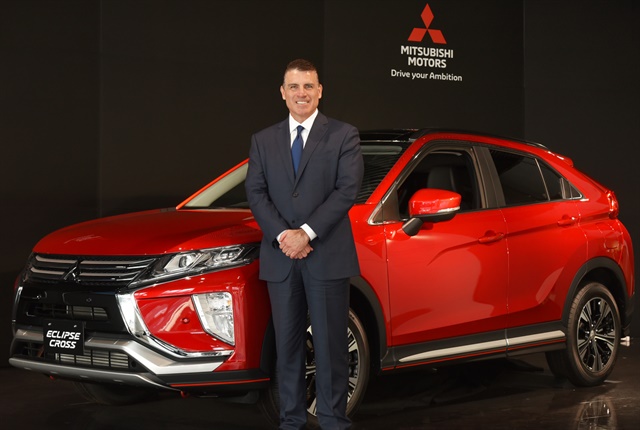 <p><em>Photo of Fred Diaz with the Eclipse Cross courtesy of Mitsubishi.</em></p>