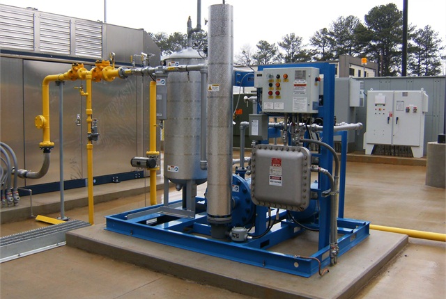 One of the components of a natural gas fueling station is a dryer (pictured). Replacement of these components should be taken into consideration when calculating the total cost of CNG. <em>Photo courtesy of ET Environmental.